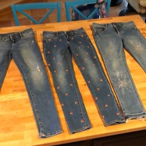 Three pairs of Gap skinny jeans